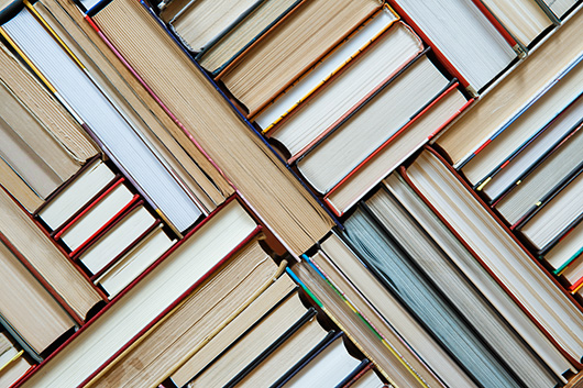 Many Books Piles. Hardback Books On Wooden Table. Books Stack Te